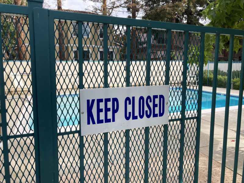 Mesh Fence Secured at Pool Gate